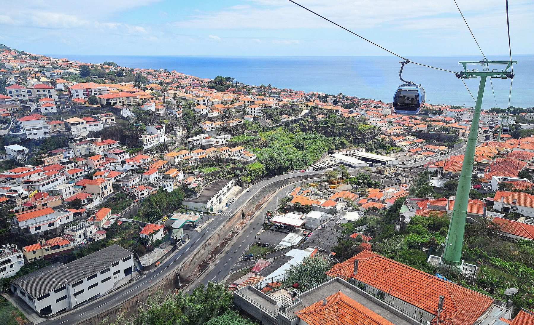 Funchal old town and marina seen from the sea at golden hour